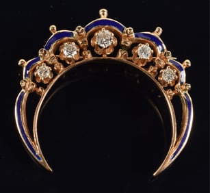14K gold diamond mounted crescent form pin with blue enamel decoration. 5 graduated diamonds,