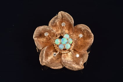 14K gold opal and diamond flower form pin. Cluster of round opals in center with a single elevated