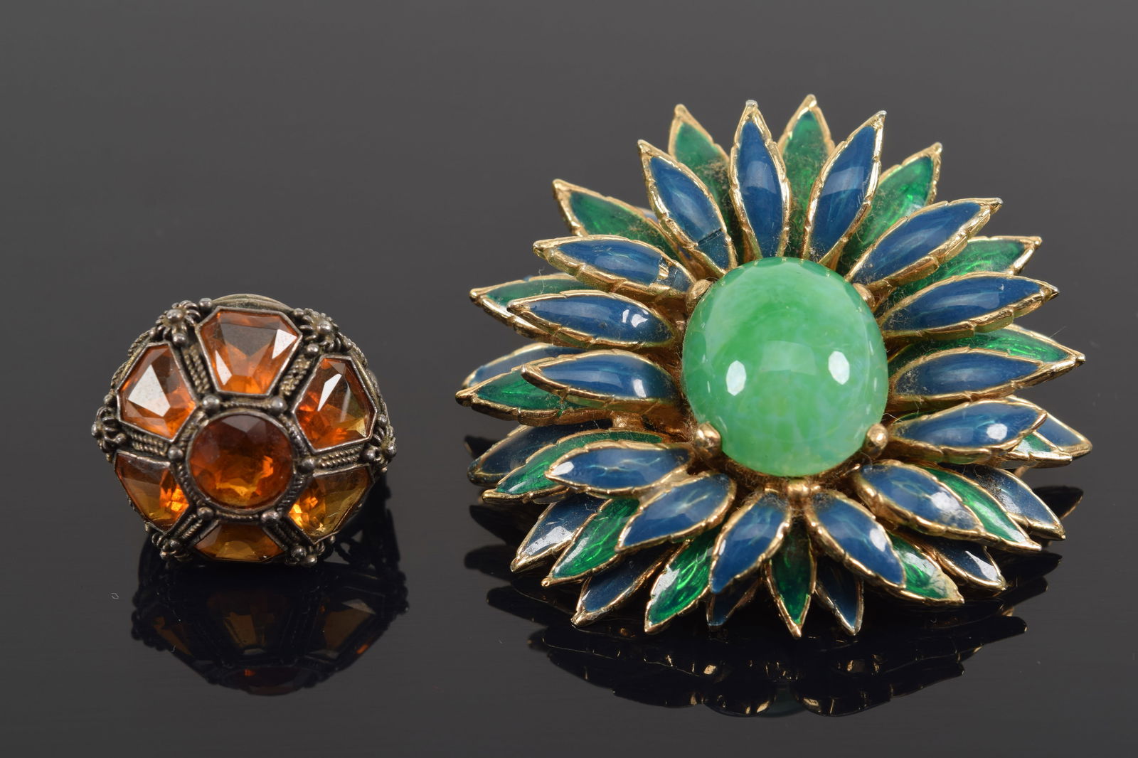 Lot of 2 jewelry items. 1) Mid century Ciner enamel decorated tiered floral pin with large faux jade (1 of 8)