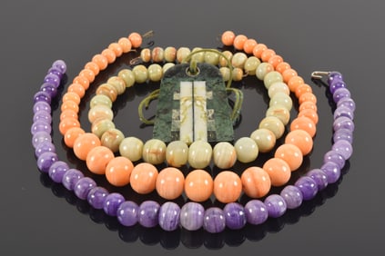 3 vintage mid century necklaces in green, orange, and purple polished stones. Together with a