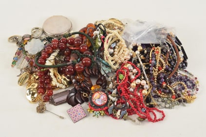 Large lot of costume jewelry together with some pieces of sterling silver designer jewelry.