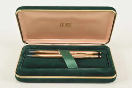 Cased 14k gold cross pen and pencil set in original green velvet case. Case 7in long.