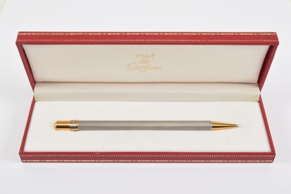 Must de Cartier gold plated pen and case. Brushed metal design.