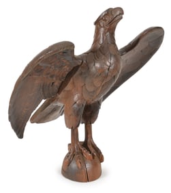 Carved oak full bodied eagle with spread wings, ca 1900. One wing is an old replacement. Age cracks