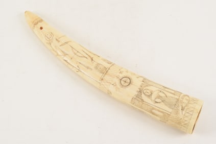 19th century Scrimshaw decorated walrus tusk, decorated with house, domed building, trees, a female