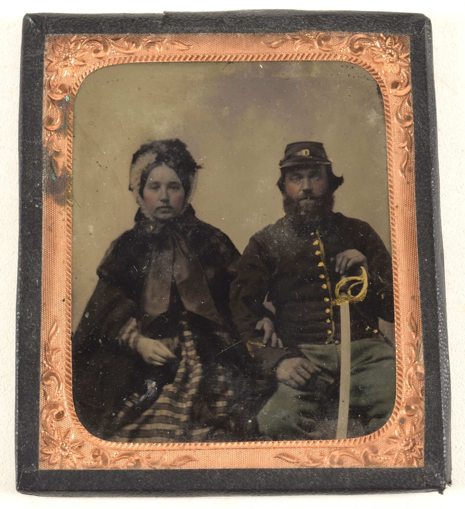 19th century tintype photograph of Union Civil War soldier in corporal's uniform with sword. Gilt (1 of 3)