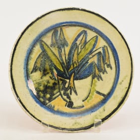 Henry Varnum Poor glazed art pottery dish. Tabletop still life of flowers in a vase. Blue and black