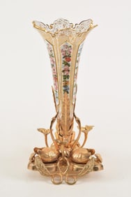 Bohemian glass vase in gilt bronze base with white loral and gilt decorations. Height 15 in.
