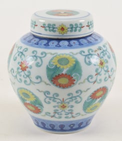 Porcelain covered jar. China. Chien lung mark and period (1735-1796). Tou tsai ware. With overall