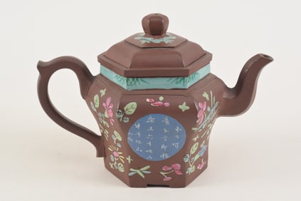Antique yixing hexagonal enamel decorated teapot with floral decoration and two blue rondels with