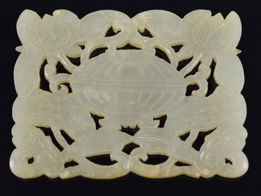 Chinese pale celadon jade pierced floral decorated plaque. 3 x 2.125in.