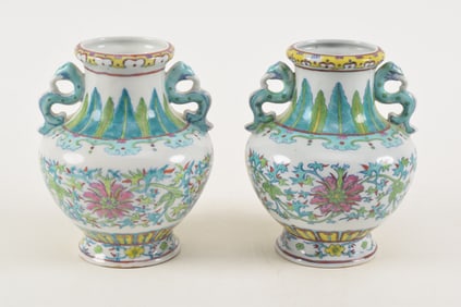 Pair of 20th century Chinese famille rose decorated vases with serpent handles, probably Republic