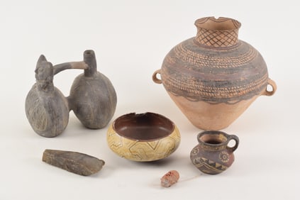 Grouping of Mesoamerican artifacts, to include: small double sided pottery mask, stone axe head,