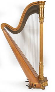 Wurlitzer Starke Model harp and case, serial no 777. Tiger maple and gilt wood. 7 pedals, 46: Wurlitzer Starke Model harp and case, serial no 777. Tiger maple and gilt wood. 7 pedals, 46 strings. Light wear, some loose glue on aperture panel. Includes original case. Height 70 in, width 34 in.
