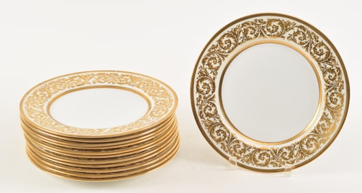 12 Royal Doulton for Tiffany & Co. porcelain plates. Ornate raised scrolling gilt decoration with