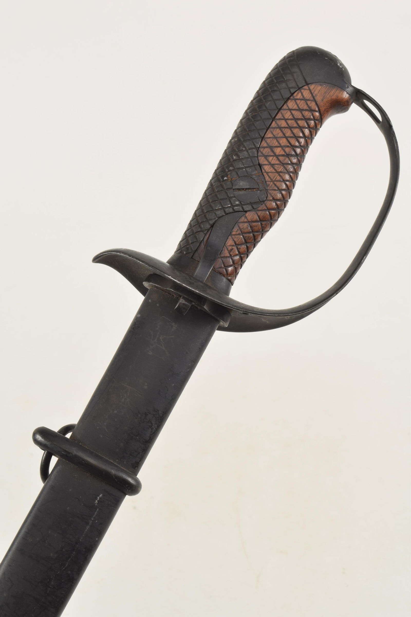 Japanese pre-WWI era cavalry sword. Cross-hatched wooden grip. 28645 serial number on ricasso. (1 of 5)