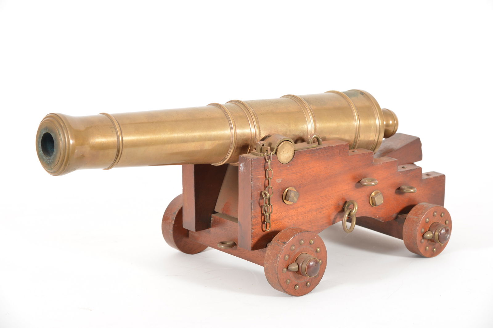 Late 19th century bronze signal cannon on wooden carriage with brass studded wheels. Adjustable (1 of 8)