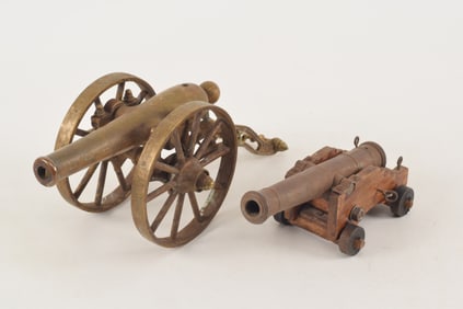 2 miniature cannons. 1) All brass cannon with screw back elevation adjuster. 10in length. 2) Small