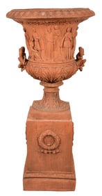 Terracotta classical style urn with raised allegorical figures and foliate decorations. Rectangular