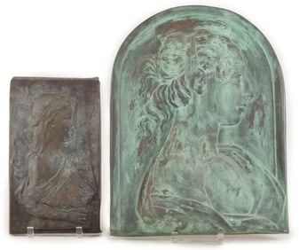 Pair of antique bronze plaques, each depicting the bust of a woman. The larger with arched top, the