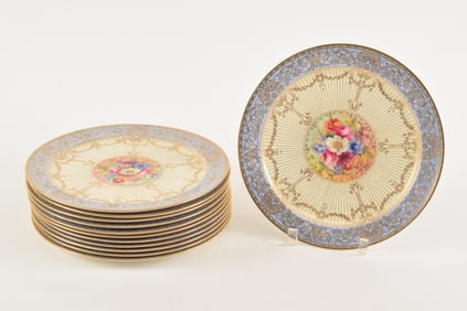 12 Royal Worcester porcelain jeweled cabinet plates. Central floral vignette, artist signed. 10.5in