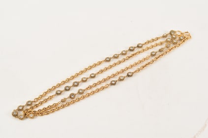 Chanel heavy gold link costume necklace with colorless stones. Marked on tag near clasp.