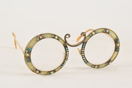 2 pairs of Christian Dior enameled and jeweled eyeglasses. One with loose lens, the other with small