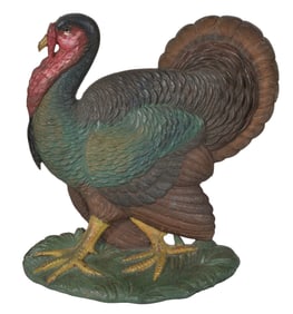 Antique cast iron turkey doorstop with original paint. 13in high.