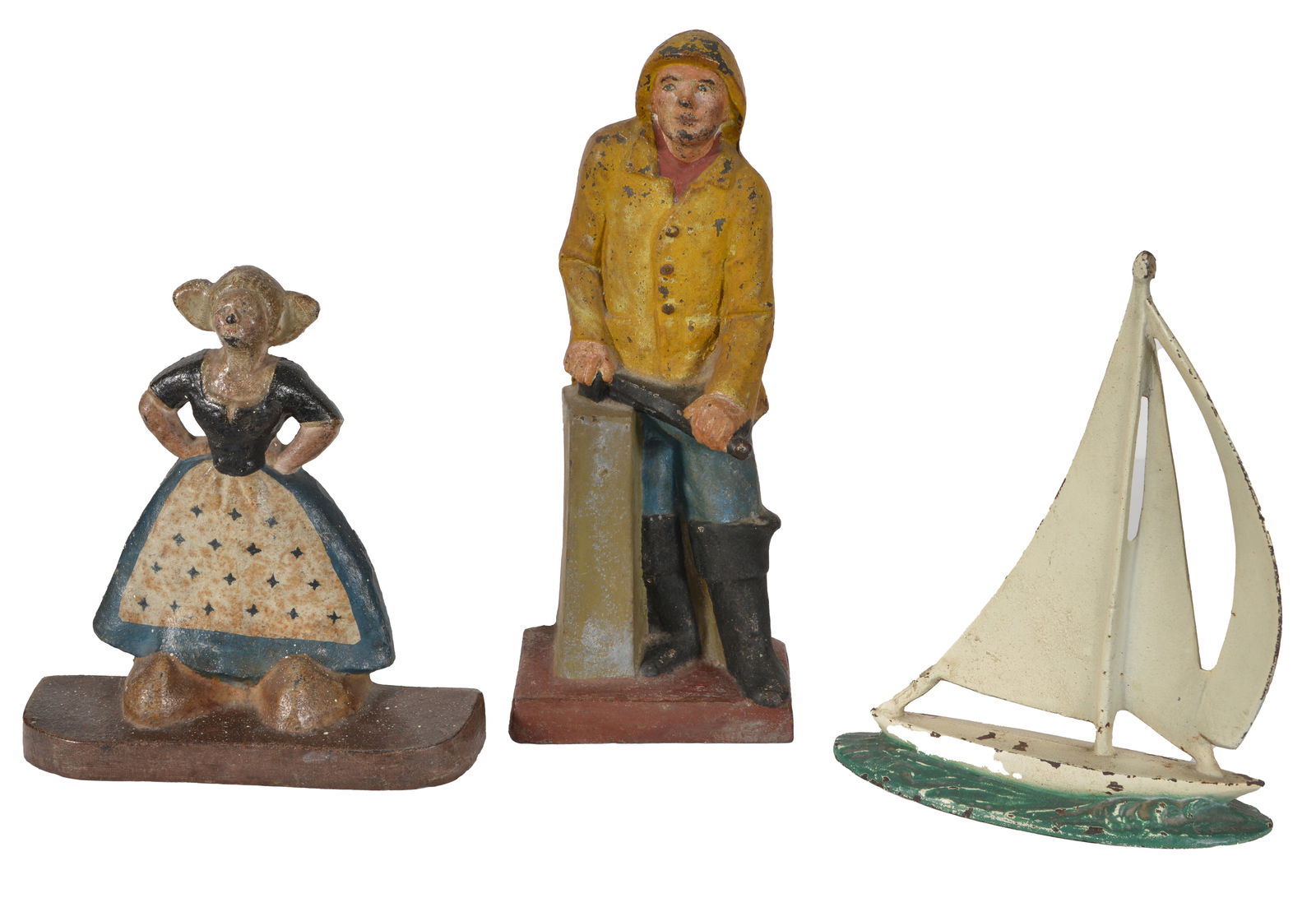 Lot of 3 antique cast iron doorstops. Old Salt, Dutch Girl, and Sailboat. 14in highest. (1 of 2)