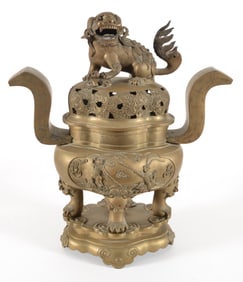 Bronze incense burner and stand. China. 19th century. Foo dog tripod base and finial. Body decorated