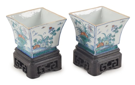 Pair of porcelain wine cups. China. Kang Hsi period. 18th century. Square form. Tou tsai decoration