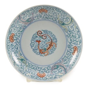 Porcelain plate. China. Yung Cheng period, 18th century. Tou tsai decoration of chih lung and ling