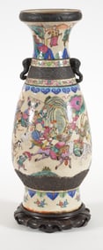 Porcelain vase. China. Late 19th century. Oatmeal ground. Decoration of an historical scene in