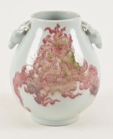 Porcelain vase with deer handles. China. Ca. 1900. Underglaze red decoration. Kang Hsi mark. Rim