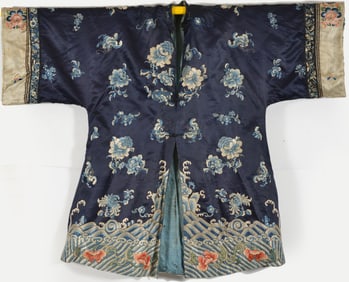 Women's informal robe. China. Early 20th century. Floral embroidery on a dark blue ground. Stains