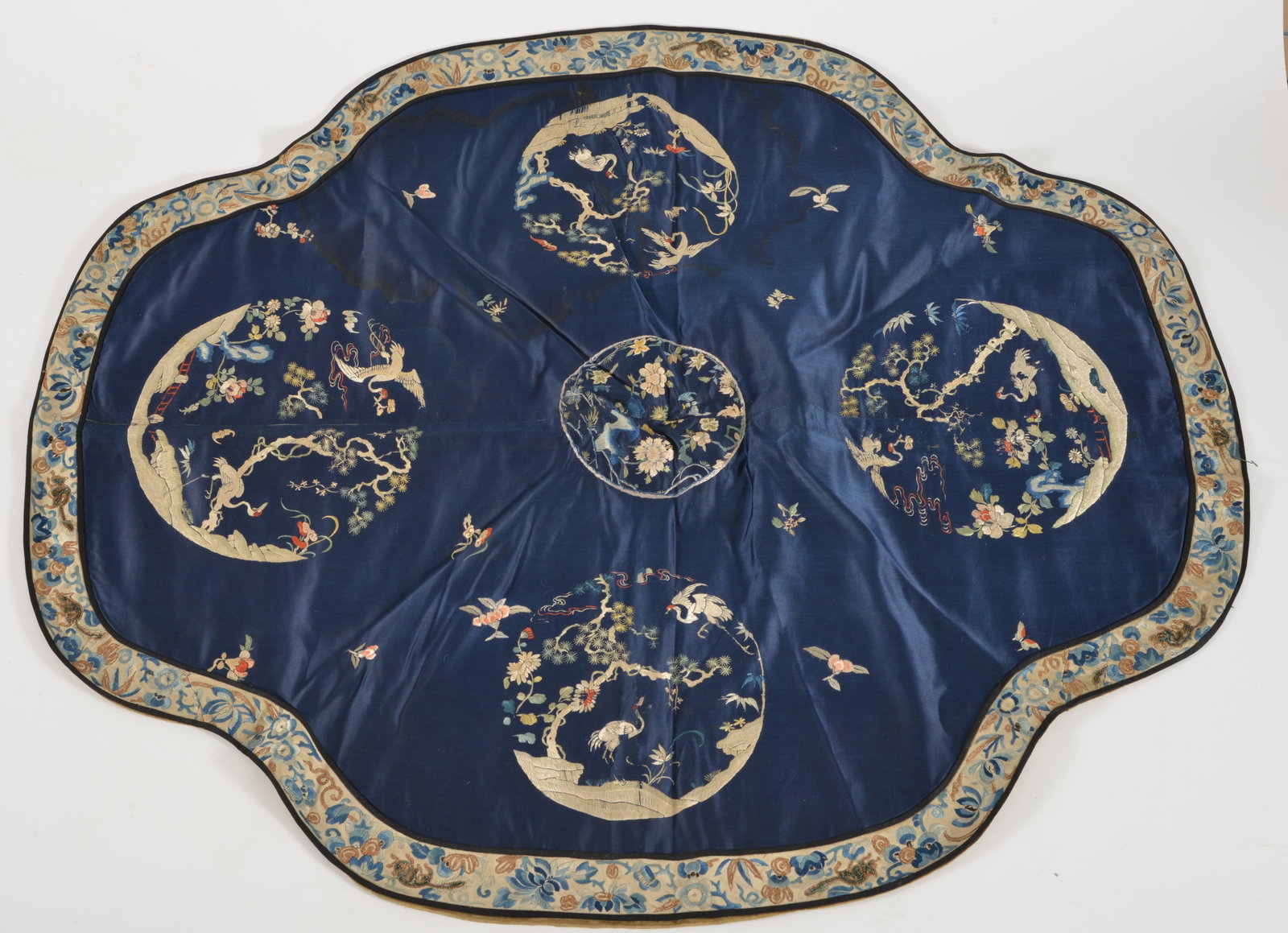 Embroidered quatrefoil panel. China. Early 20th century. 80in wide.: Embroidered quatrefoil panel. China. Early 20th century. 80in wide.