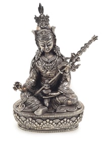 Silver buddhist image. Tibet. 19th century. Finely chased image of Guru-Rinpoche. 6in high.