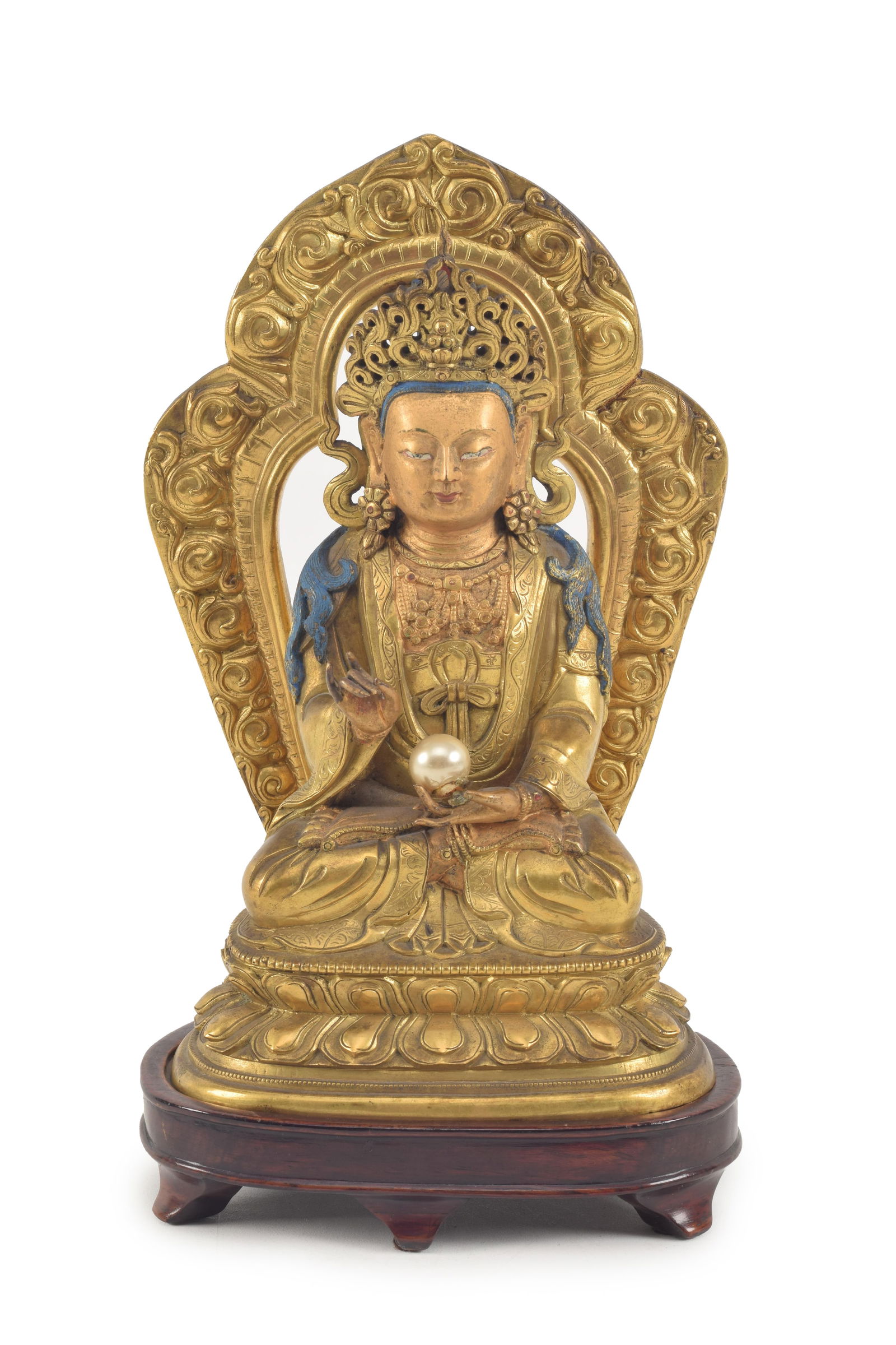 Gilt bronze image of a buddha. China. 18th century. Seated figure. Gilt halo on the back. Bronze: (1 of 20)