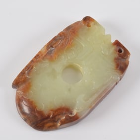 Jade carving. Archaic form. China. 18th century or earlier. Heart shaped pendant decorated with Tao