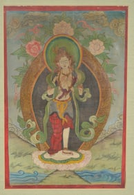 Buddhist thangka. Tibet. Early 20th century. Standing figure of the white Tara. Framed under glass.