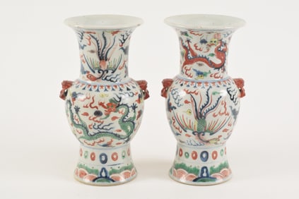 Pair of porcelain vases. China. Wan Li mark and possibly of the period. Ku beaker shape. Phoenix and