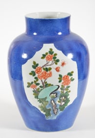 Porcelain vase. China. 19th century. Powder blue ground with famille verte scenes of birds, flowers,