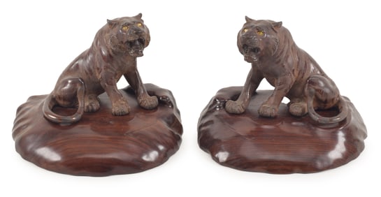 Pair of bronze tigers. Japan. Meiji period (1868-1912). Inlaid eyes. Fitted stands. Each 6 x 6in.