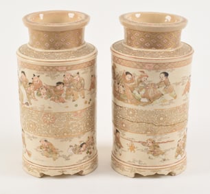 Pair of Satsuma vases. Japan. Meiji period (1868-1912). Cylindrical form. Decoration of children