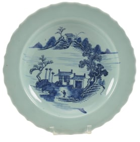 Large 19th century celadon ground footed dish with underglaze blue landscape decoration. Ming mark