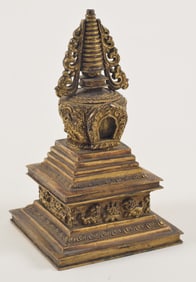 Repousse gilt copper stupa. China. 18th century. 5.5in.
