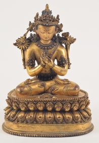 Large gilt bronze. Nepal. 16th century. Image of Manjushri seated on a double lotus throne. Surface