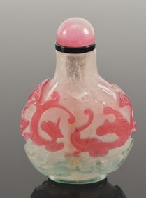 Cameo glass snuff bottle. China. 19th century. 2 colors cut to snowflake with chih lung. 2in.