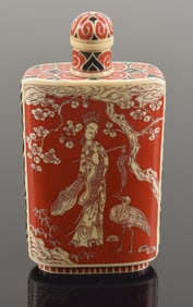 Carved snuff bottle. China. 19th century. surface inlaid with red and black lacquer. Chien Lung