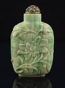 Jade snuff bottle. China. Early 20th century. Unusual striated material. 3in.